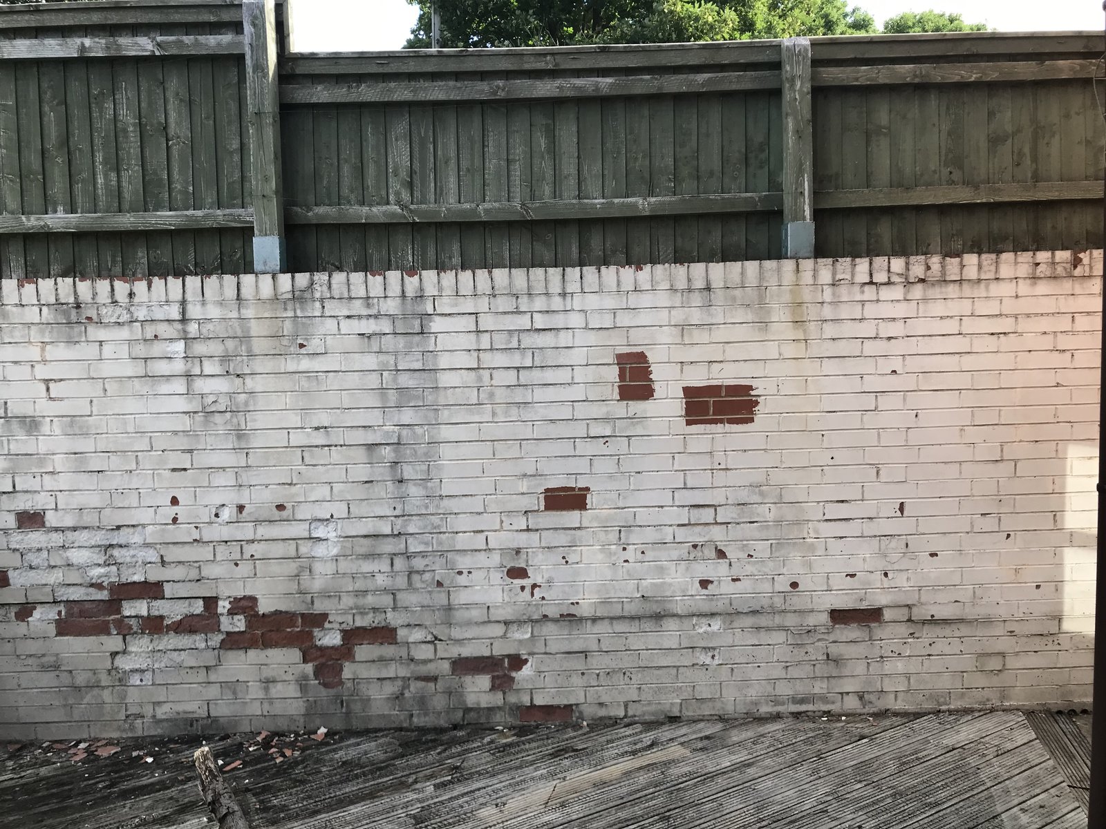 An image of brick wall paint removal before 002 goes here.