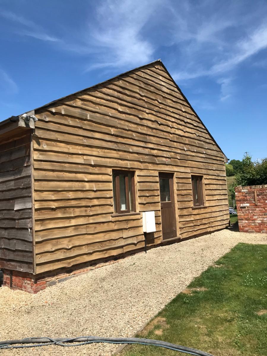 Image of Wooden Outbuilding after Abrasive Cleaning